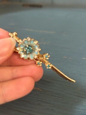Vintage 1940’s-50’s Art Deco Gold-Tone Floral Pin with Blue Crystal Accents